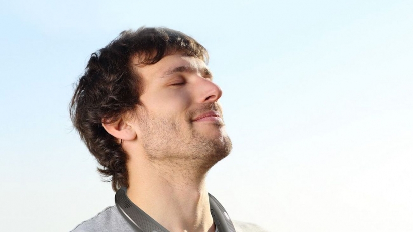 Hands On With LG’s New Wireless Earbuds and … Neck Speakers