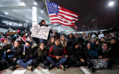 President Trump wants to keep them out. Airbnb is inviting them in