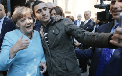 Syrian refugee sues Facebook for ‘defamatory’ posts after selfie with Angela Merkel
