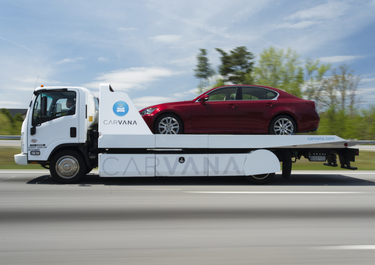 Auto site Carvana tumbles 26% in stock market debut