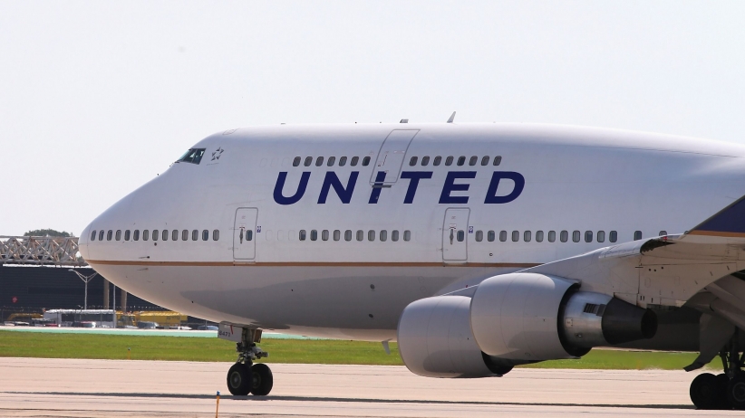 United Airlines Passenger Dragged Off Plane by Employees